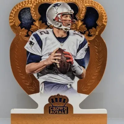 Sale Photo Thumbnail #63: Panini Crown Royale die-cut trading card featuring New England Patriots quarterback Tom Brady.