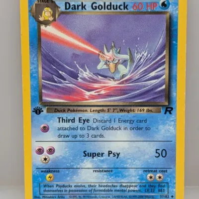 Sale Photo Thumbnail #265: 1st Edition Dark Golduck Pokémon trading card (#37/82) from the Team Rocket expansion, copyright 1999–2000 Wizards of the Coast.