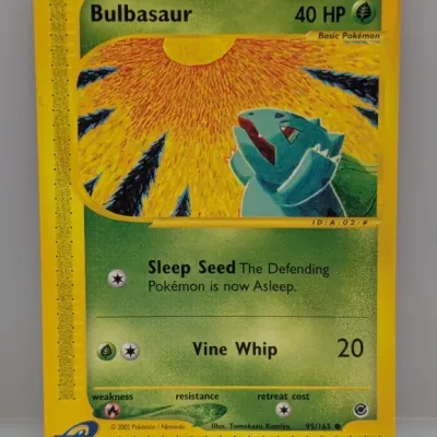 Sale Photo Thumbnail #192: 2002 Pokémon Expedition e-Reader Bulbasaur trading card (#95/165) with artwork by Tomokazu Komiya.
