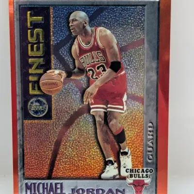 Sale Photo Thumbnail #137: 1995-96 Topps Finest Michael Jordan Chicago Bulls basketball card featuring a refractor-style foil finish.