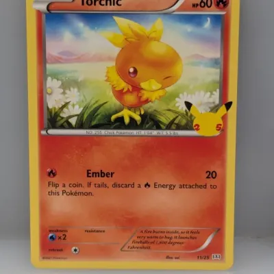 Sale Photo Thumbnail #707: 2021 Pokémon Torchic 25th Anniversary McDonald's promo trading card, numbered 11/25.
