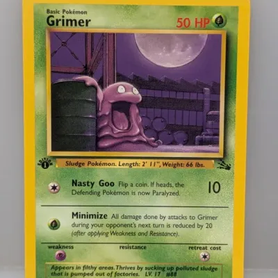 Sale Photo Thumbnail #349: 1st Edition Grimer Pokémon trading card from the 1999 Fossil set (#48/62), illustrated by Mitsuhiro Arita.