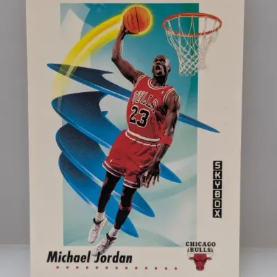 Sale Photo Thumbnail #676: 1990-91 SkyBox Michael Jordan Chicago Bulls #41 basketball trading card featuring a vibrant graphic design background.