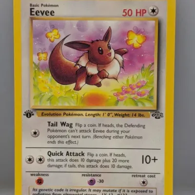 Sale Photo Thumbnail #530: 1st Edition Eevee Pokémon card (#51/64) from the 1999 Jungle set, illustrated by Kagemaru Himeno.