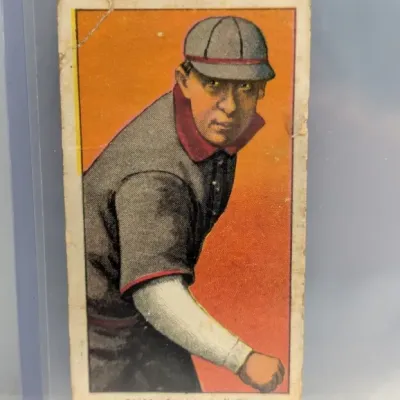 Sale Photo Thumbnail #16: T206 tobacco baseball card featuring Jack Bliss of the St. Louis National League team, circa 1909-1911. The card displays moderate corner wear and visible creasing near the upper left.