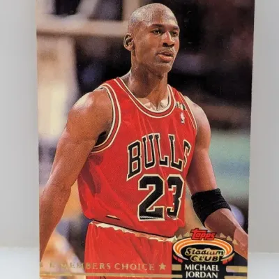 Sale Photo Thumbnail #665: Topps Stadium Club Members Choice Michael Jordan basketball trading card featuring him in his Chicago Bulls uniform.