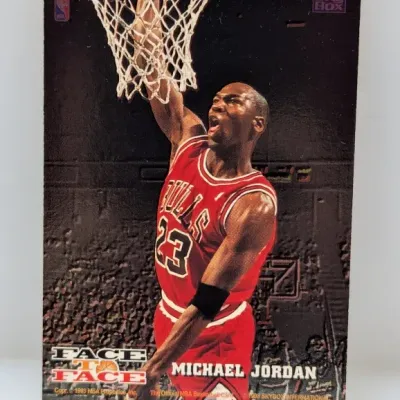 Sale Photo Thumbnail #697: 1993 SkyBox Michael Jordan Face to Face basketball trading card showing minor edge wear.