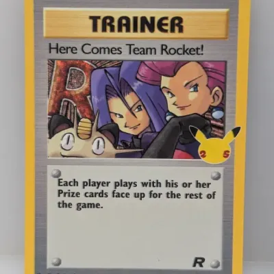 Sale Photo Thumbnail #226: Pokémon TCG 'Here Comes Team Rocket!' Trainer holo card from the 25th Anniversary Celebrations subset, in near-mint condition.