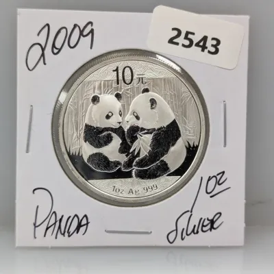Sale Photo Thumbnail #868: 2009 Chinese Silver Panda 10 Yuan coin, 1 oz .999 fine silver, presented in a cardboard coin flip.