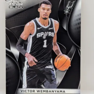 Sale Photo Thumbnail #116: Victor Wembanyama Topps Chrome Black San Antonio Spurs rookie trading card in excellent condition.