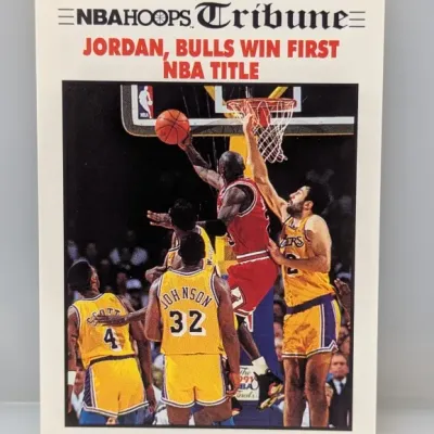 Sale Photo Thumbnail #391: 1991-92 NBA Hoops Tribune Michael Jordan basketball trading card, commemorating the Chicago Bulls' first NBA championship.