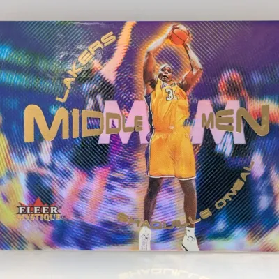 Sale Photo Thumbnail #202: 1999-00 Fleer Mystique "Middle Men" insert trading card featuring Shaquille O'Neal of the Los Angeles Lakers.
