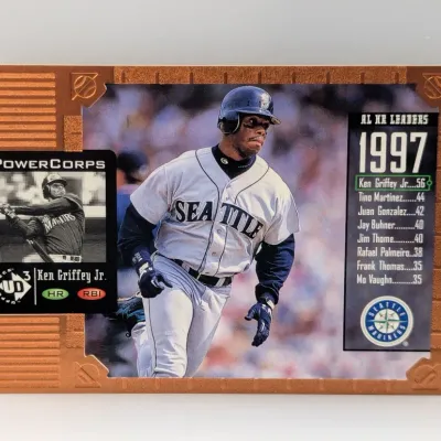 Sale Photo Thumbnail #593: Upper Deck PowerCorps Ken Griffey Jr. 1997 AL HR Leaders baseball card, highlighting his 56 home runs with the Seattle Mariners.