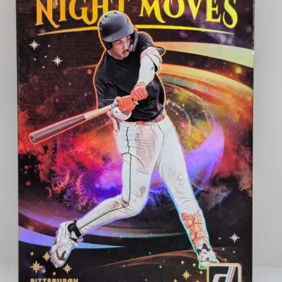 Sale Photo Thumbnail #41: Donruss "Night Moves" trading card featuring Konnor Griffin, displayed in a protective sleeve and in good condition.