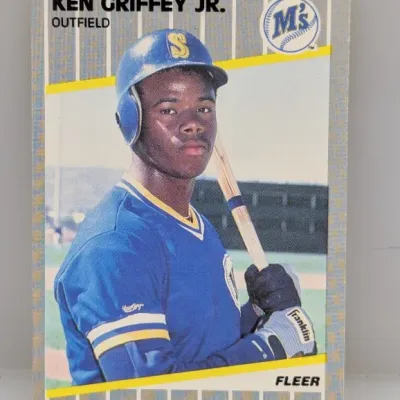 Sale Photo Thumbnail #747: 1989 Fleer Ken Griffey Jr. rookie baseball card #548, depicting him in a Seattle Mariners uniform.