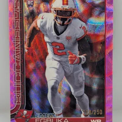 Sale Photo Thumbnail #236: Topps Chrome Emeka Egbuka rookie trading card featuring a pink wave refractor finish, numbered 118/250.