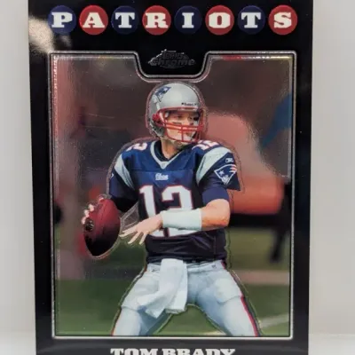 Sale Photo Thumbnail #172: 2006 Topps Chrome Tom Brady Black Refractor trading card featuring him in his New England Patriots uniform.
