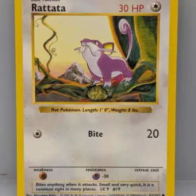 Sale Photo Thumbnail #784: 1999 Pokémon Base Set Rattata trading card (61/102) in good condition with illustrated artwork by Mitsuhiro Arita.