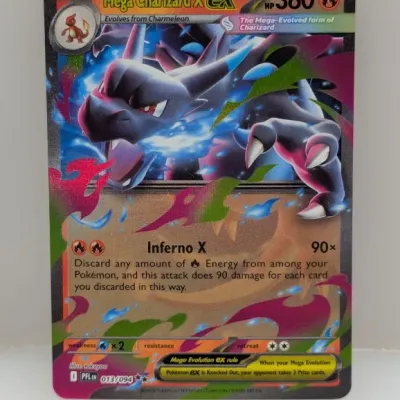 Sale Photo Thumbnail #331: Mega Charizard X ex full-art Pokémon trading card (013/094) featuring full-card holographic foil detail.
