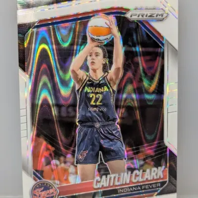 Sale Photo Thumbnail #321: Panini Prizm Caitlin Clark Indiana Fever WNBA trading card with a silver holographic finish, shown in sharp condition.