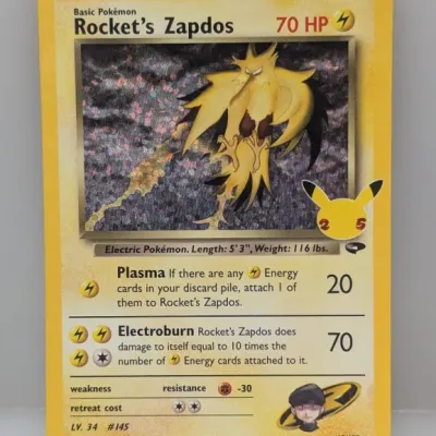 Sale Photo Thumbnail #241: Pokémon Celebrations Classic Collection Rocket's Zapdos holo trading card, numbered 15/132.