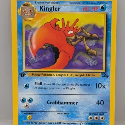 Sale Photo Thumbnail #175: 1st Edition Kingler Pokémon trading card from the 1999 Fossil set, numbered 38/62.