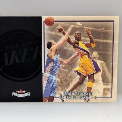 Sale Photo Thumbnail #485: 2003-04 Fleer Patchworks Kobe Bryant Los Angeles Lakers basketball card in good condition.