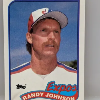 Sale Photo Thumbnail #445: 1989 Topps Randy Johnson rookie baseball card #647 featuring the pitcher in his Montreal Expos uniform.