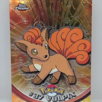 Sale Photo Thumbnail #754: 2000 Topps Chrome Pokémon #37 Vulpix spectra chrome trading card featuring a vibrant holographic finish.