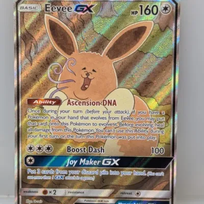 Sale Photo Thumbnail #44: Eevee GX full art promo Pokémon card SM233 illustrated by Q-rais, released in 2019.