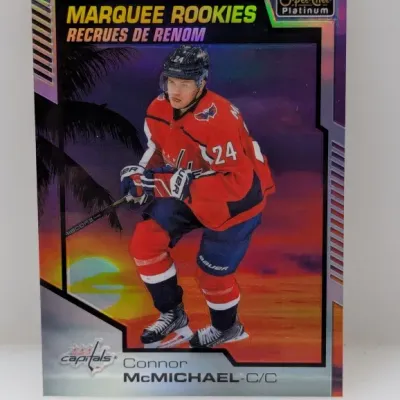 Sale Photo Thumbnail #585: O-Pee-Chee Platinum Connor McMichael Marquee Rookies holographic trading card featuring the Washington Capitals forward.