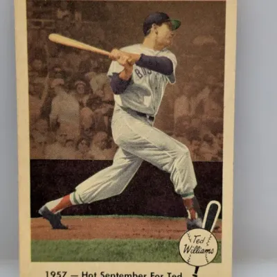 Sale Photo Thumbnail #143: 1959 Topps Ted Williams #463 baseball card titled '1957 – Hot September For Ted', featuring a full-bleed photo of Williams mid-swing.
