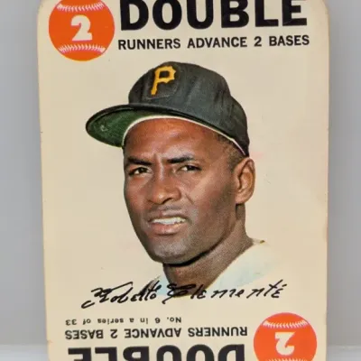 Sale Photo Thumbnail #197: 1968 Topps Game Roberto Clemente baseball card, No. 6 in a series of 33, featuring rounded corners and a printed facsimile signature.