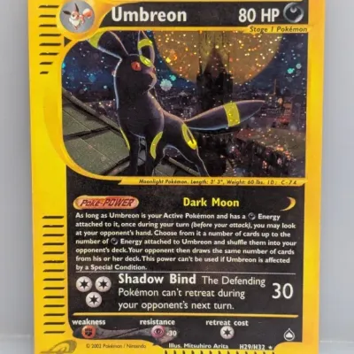 Sale Photo Thumbnail #19: 2002 Pokémon Aquapolis holographic Umbreon trading card (H29/H32) illustrated by Mitsuhiro Arita.
