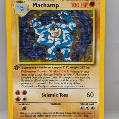 Sale Photo Thumbnail #112: 1st Edition Machamp holographic Pokémon trading card (8/102) from the 1999 Base Set.