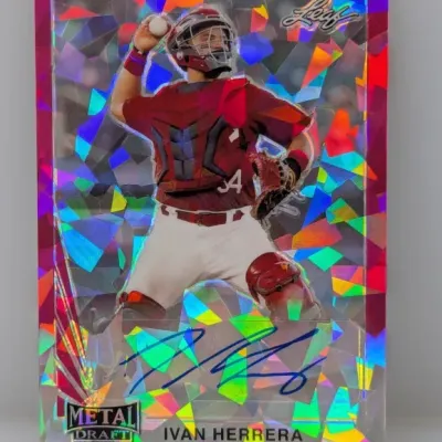 Sale Photo Thumbnail #412: Leaf Metal Draft Ivan Herrera autographed baseball card featuring a pink prismatic mosaic foil parallel.
