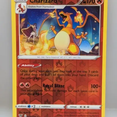 Sale Photo Thumbnail #447: 2020 Pokémon TCG Vivid Voltage Charizard reverse holo trading card (#025/185) with Battle Sense ability.