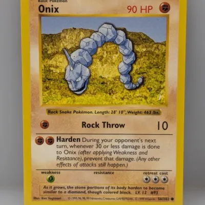Sale Photo Thumbnail #778: Vintage 1999 Pokémon Base Set Onix trading card, number 56/102, featuring artwork by Ken Sugimori.