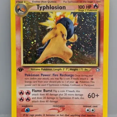 Sale Photo Thumbnail #35: 1st Edition Typhlosion holographic Pokémon card (#17/111) from the 2000 Neo Genesis set.