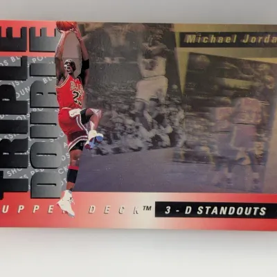 Sale Photo Thumbnail #694: 1990s Upper Deck Michael Jordan 'Triple Double' 3-D Standouts trading card in good condition.