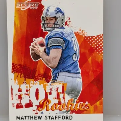 Sale Photo Thumbnail #188: 2009 Score 'Hot Rookies' Matthew Stafford trading card featuring him in his Detroit Lions uniform.