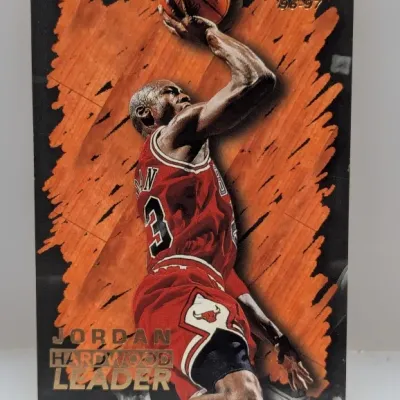 Sale Photo Thumbnail #653: 1996-97 Fleer Michael Jordan Hardwood Leader basketball trading card in well-preserved condition.