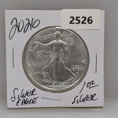 Sale Photo Thumbnail #851: 2020 American Silver Eagle 1 oz fine silver coin, housed in a cardboard flip holder.