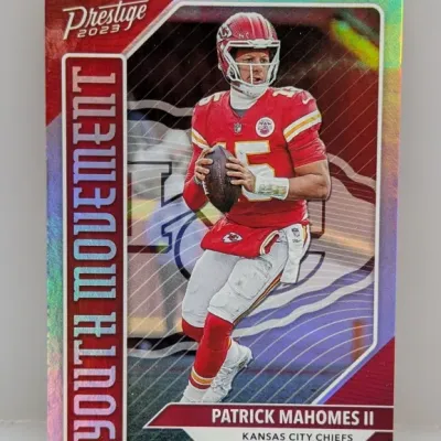 Sale Photo Thumbnail #195: 2023 Panini Prestige Patrick Mahomes II Youth Movement holographic football trading card.