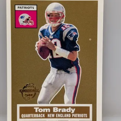 Sale Photo Thumbnail #149: 2005 Topps Football Tom Brady gold border trading card featuring the 50 Years logo, in good condition.