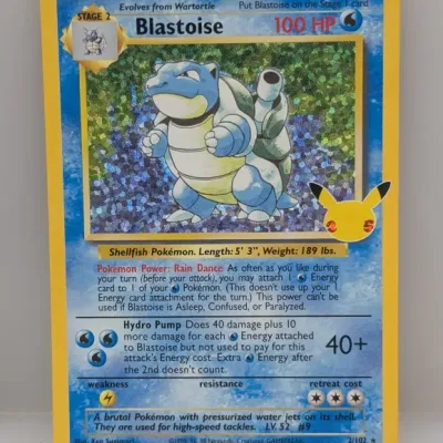 Sale Photo Thumbnail #70: Pokémon TCG 25th Anniversary Celebrations Blastoise holo card, featuring the classic Base Set artwork with a 25th anniversary stamp.