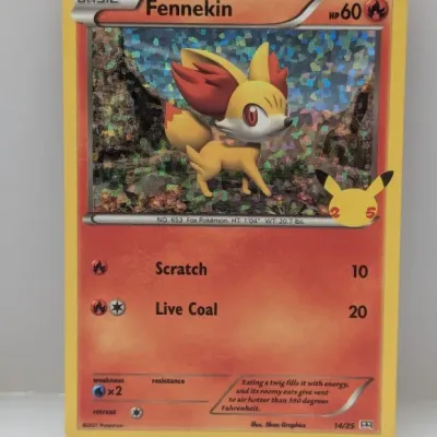 Sale Photo Thumbnail #683: Fennekin 25th Anniversary McDonalds holo promo Pokémon trading card, numbered 14/25, copyright 2021.