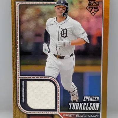 Sale Photo Thumbnail #302: Topps 75th Anniversary Spencer Torkelson baseball card featuring a embedded game-used memorabilia jersey relic patch.