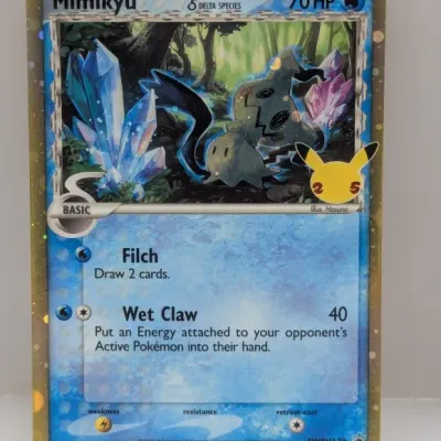 Sale Photo Thumbnail #635: 2021 Pokémon Celebrations Mimikyu Delta Species holo promo card SWSH136 in excellent condition.