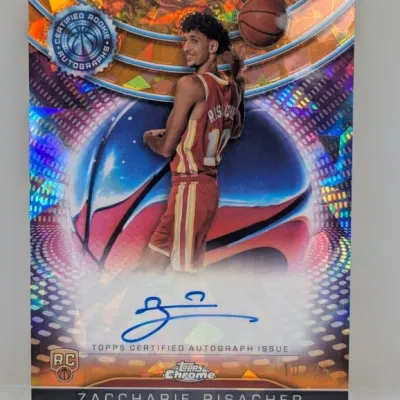 Sale Photo Thumbnail #21: Zaccharie Risacher Topps Chrome Certified Autograph Issue rookie trading card, serial numbered 10/25 with an orange refractor finish.